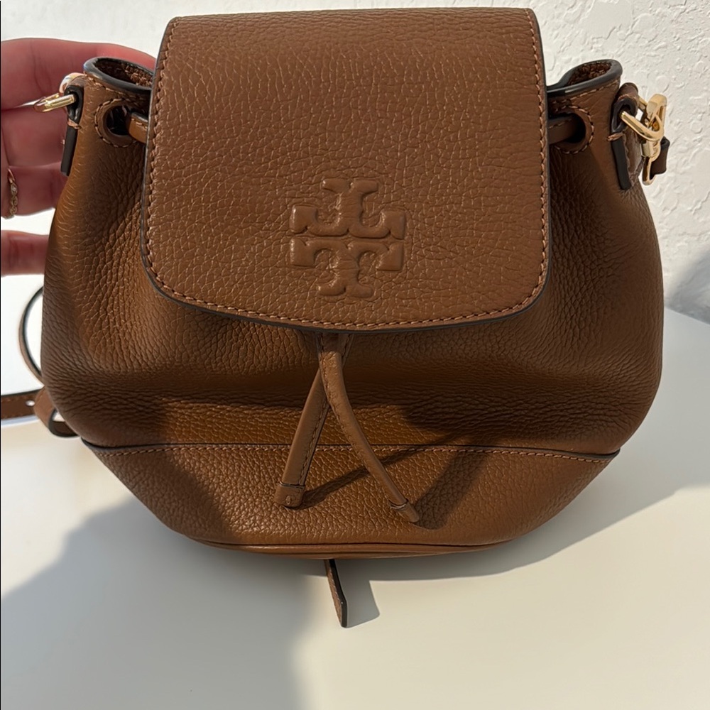 Thea mini bucket Tory Burch Brown Leather Backpack with Signature Logo